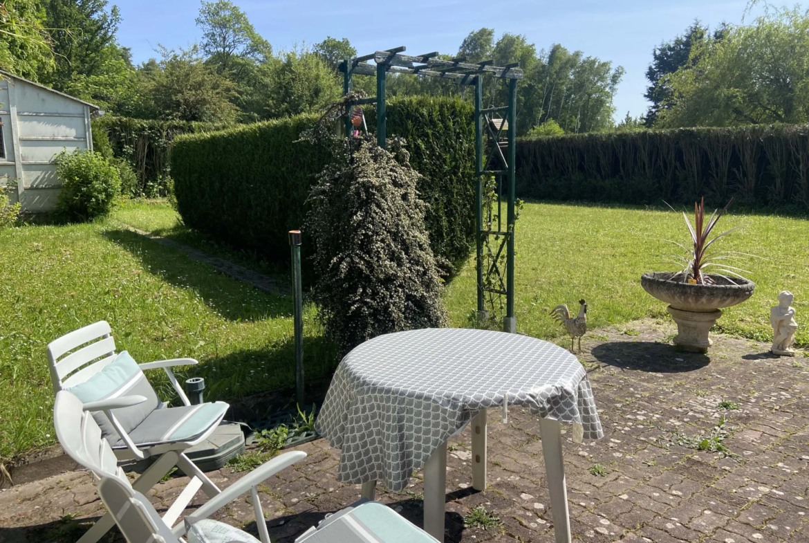 Maison de plain-pied à vendre à Rousies avec jardin et garage 