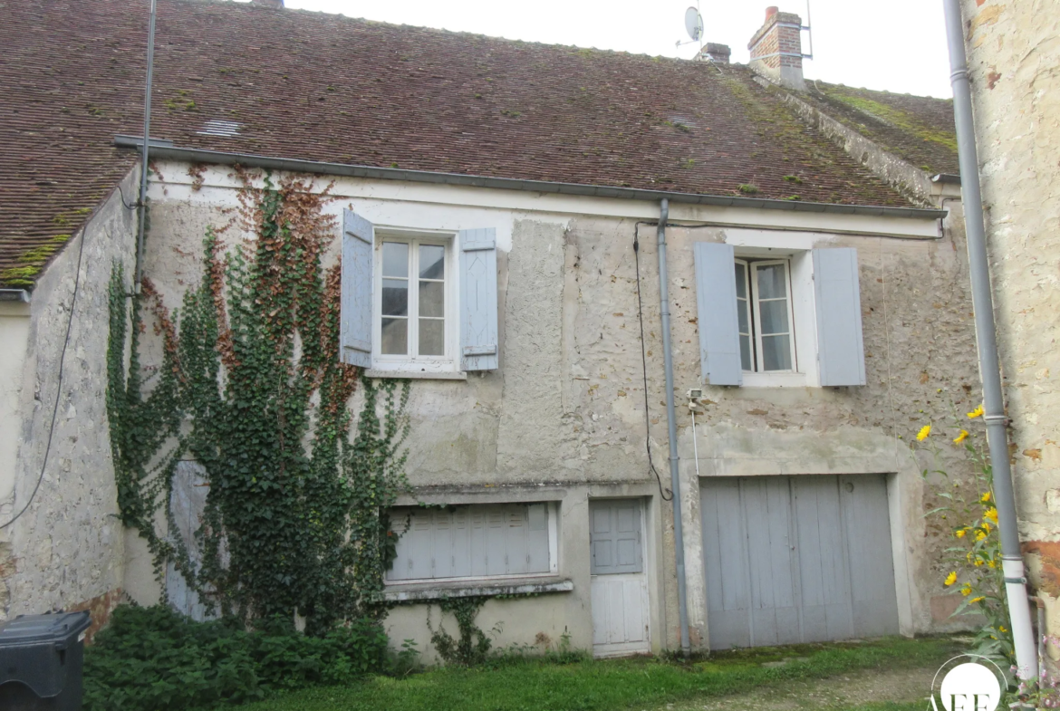 Maison à rénover à Jouy-sur-Morin - 2 chambres, jardin 