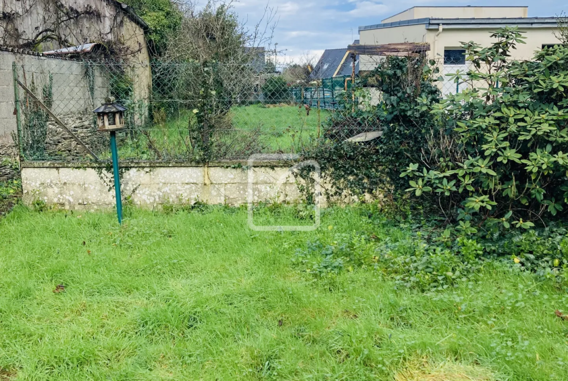 Maison de ville à Ploermel - 106 m² avec jardin et garage 