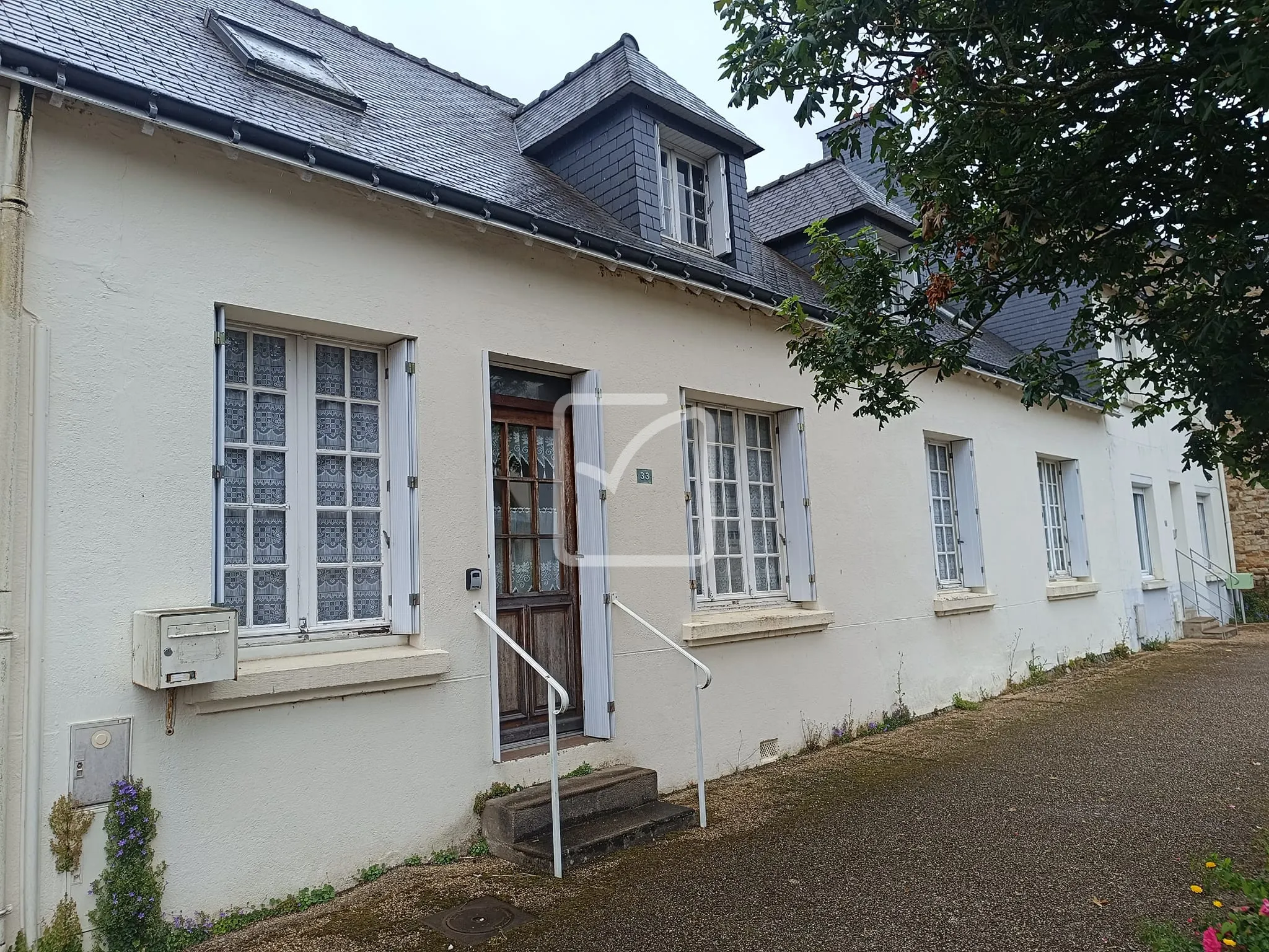 Maison de ville à Ploermel - 106 m² avec jardin et garage 