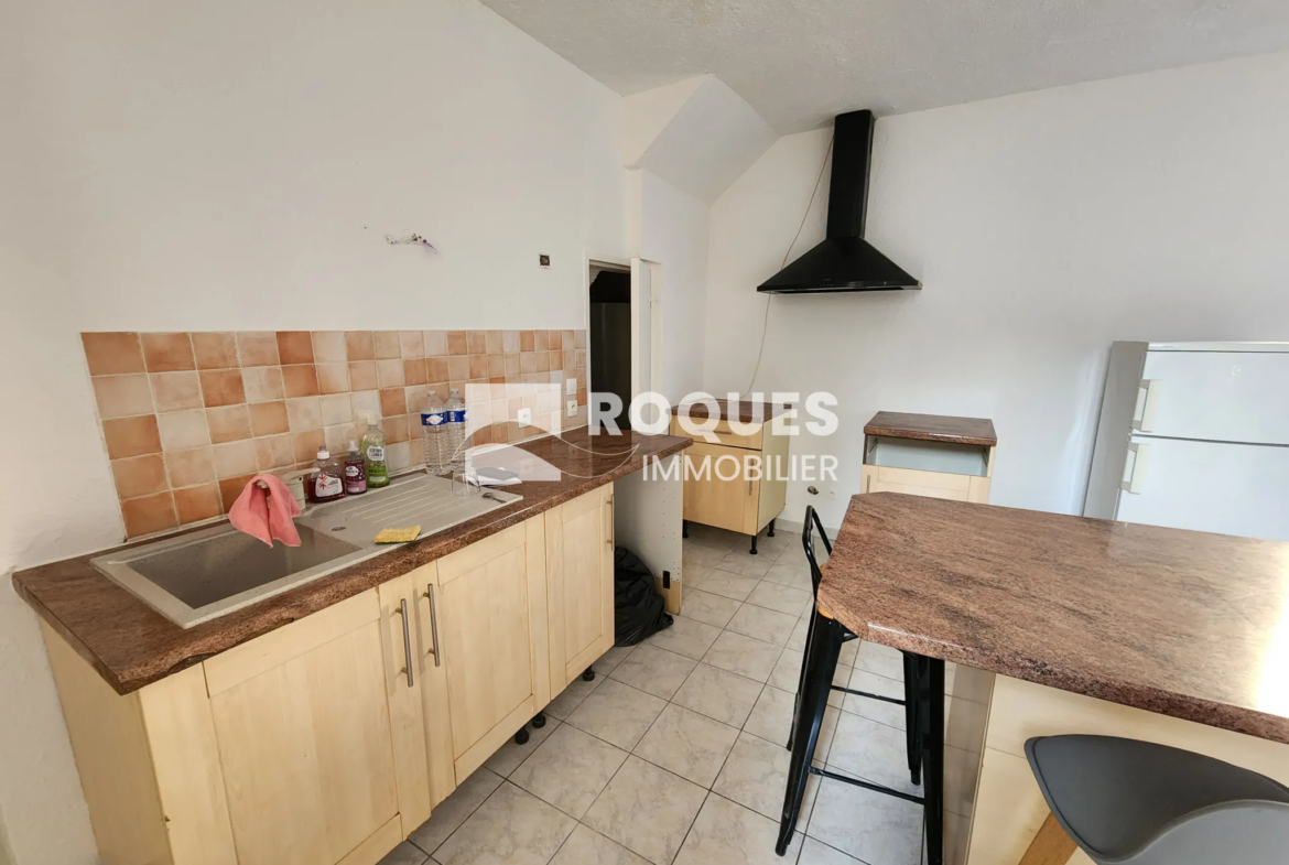 À vendre : Appartement 4 pièces au centre de Lodève, 74 m² plus terrasse 