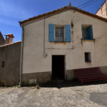 Maison de village à Coustouges avec garage et parcelles de forêt