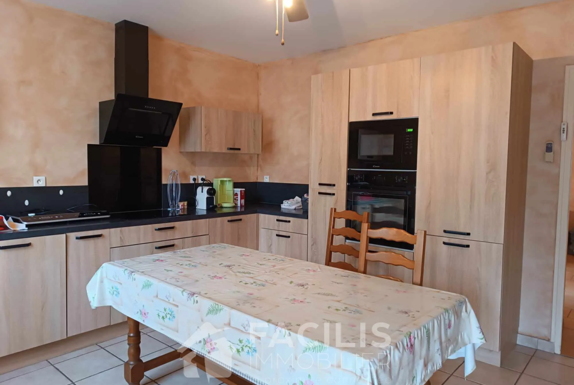 À vendre : Maison de 99 m² au Creusot avec jardin et garage 