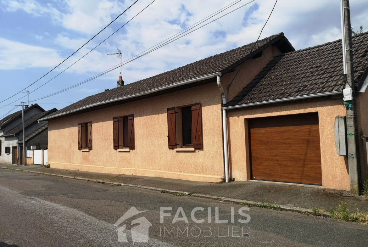 À vendre : Maison de 99 m² au Creusot avec jardin et garage 