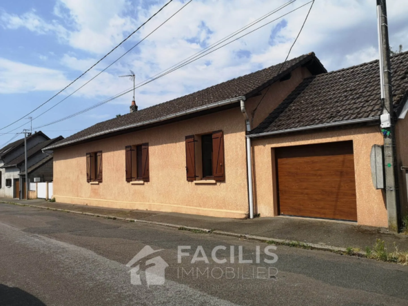 À vendre : Maison de 99 m² au Creusot avec jardin et garage