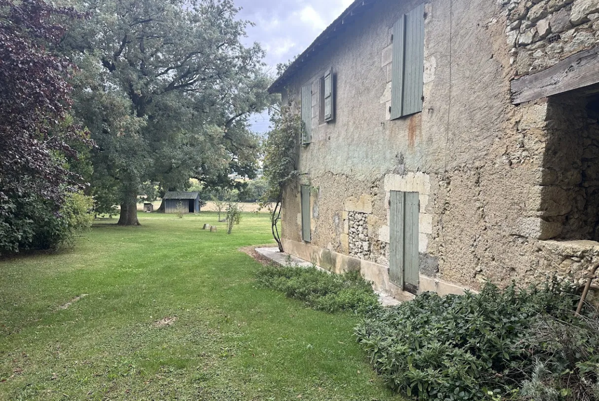 Vente d'une grande maison en pierre avec dépendances près de Fleurance 