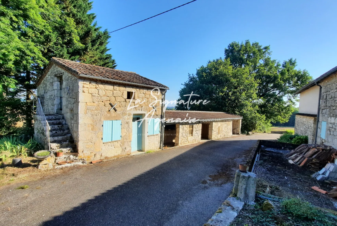 Maison en pierre à Prayssas avec dépendances et belle vue 