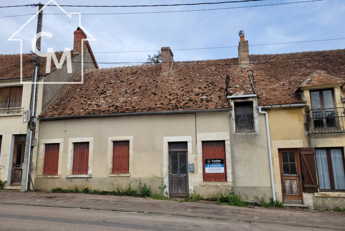 Maison de ville 3 pièces avec jardinet à Pougny - À rénover 