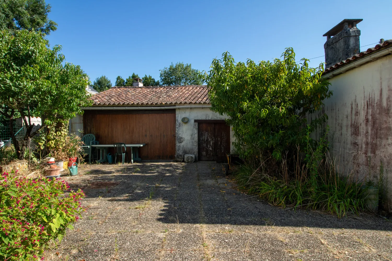 Ensemble immobilier de 3 maisons avec jardin à Nieul les Stes 