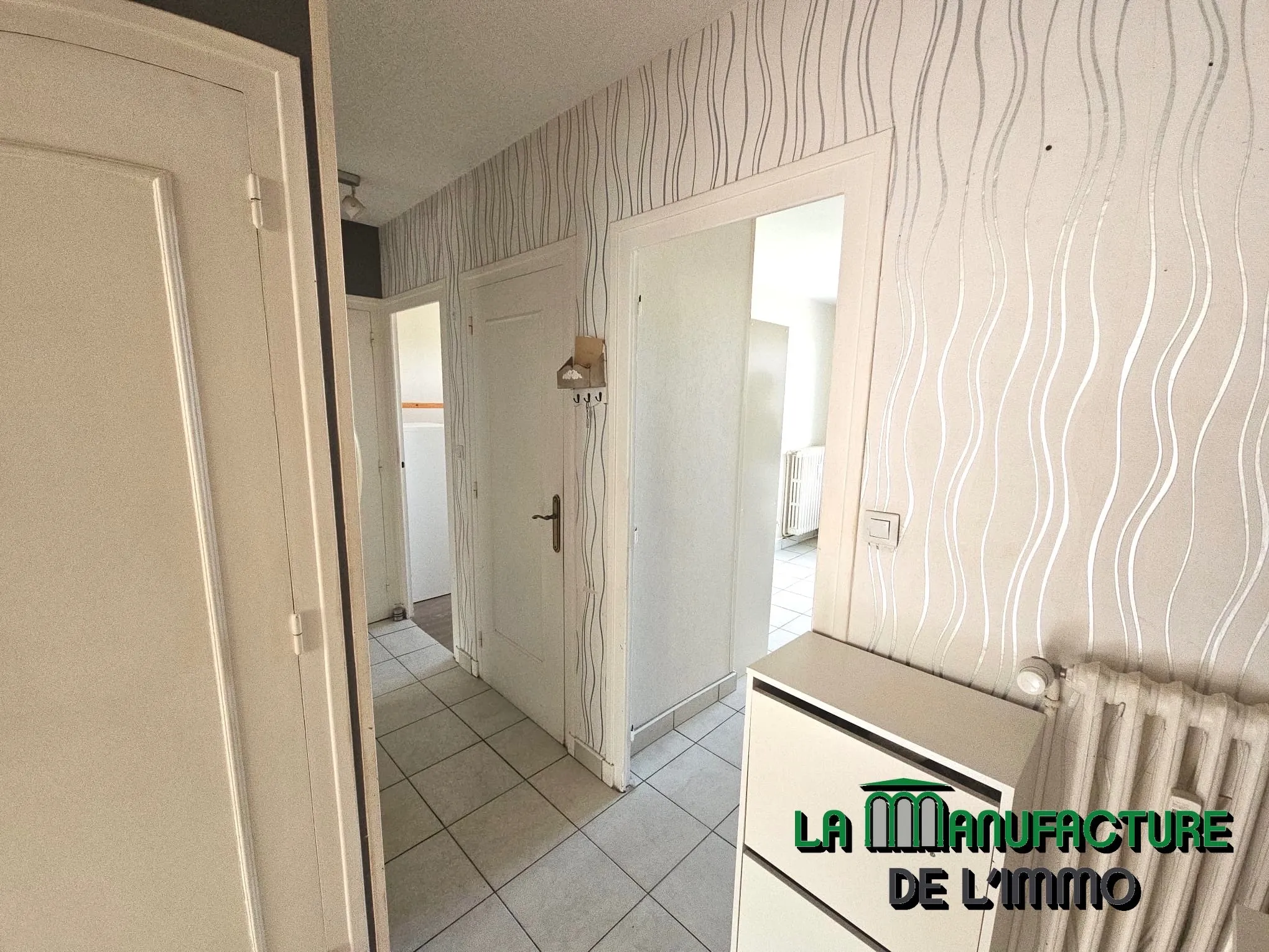 Appartement F3 traversant avec balcon à Saint-Étienne 