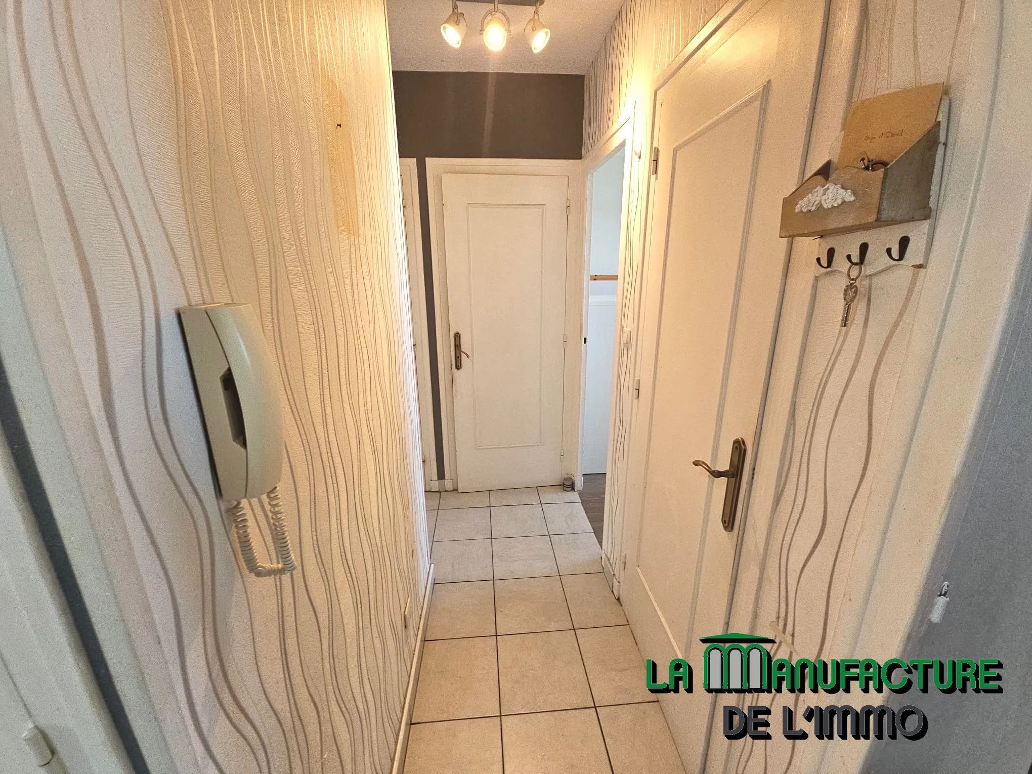 Appartement F3 traversant avec balcon à Saint-Étienne 