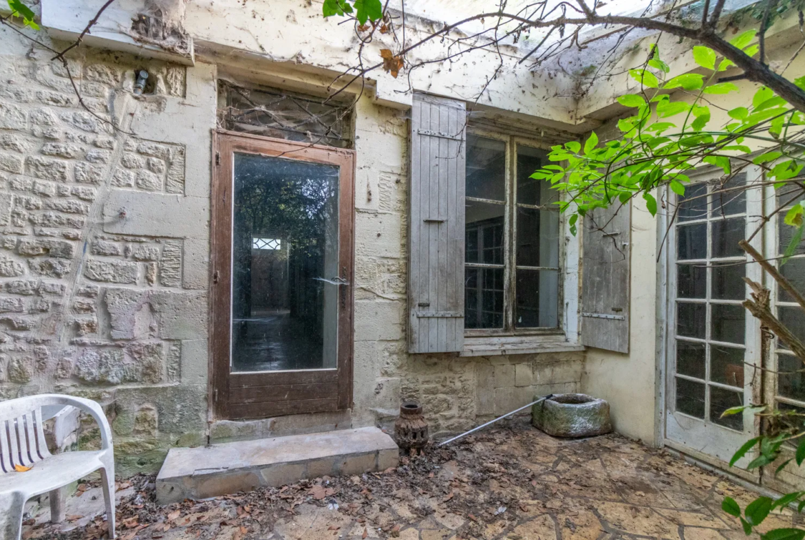 Maison de caractère avec jardin à Saint-Savinien 