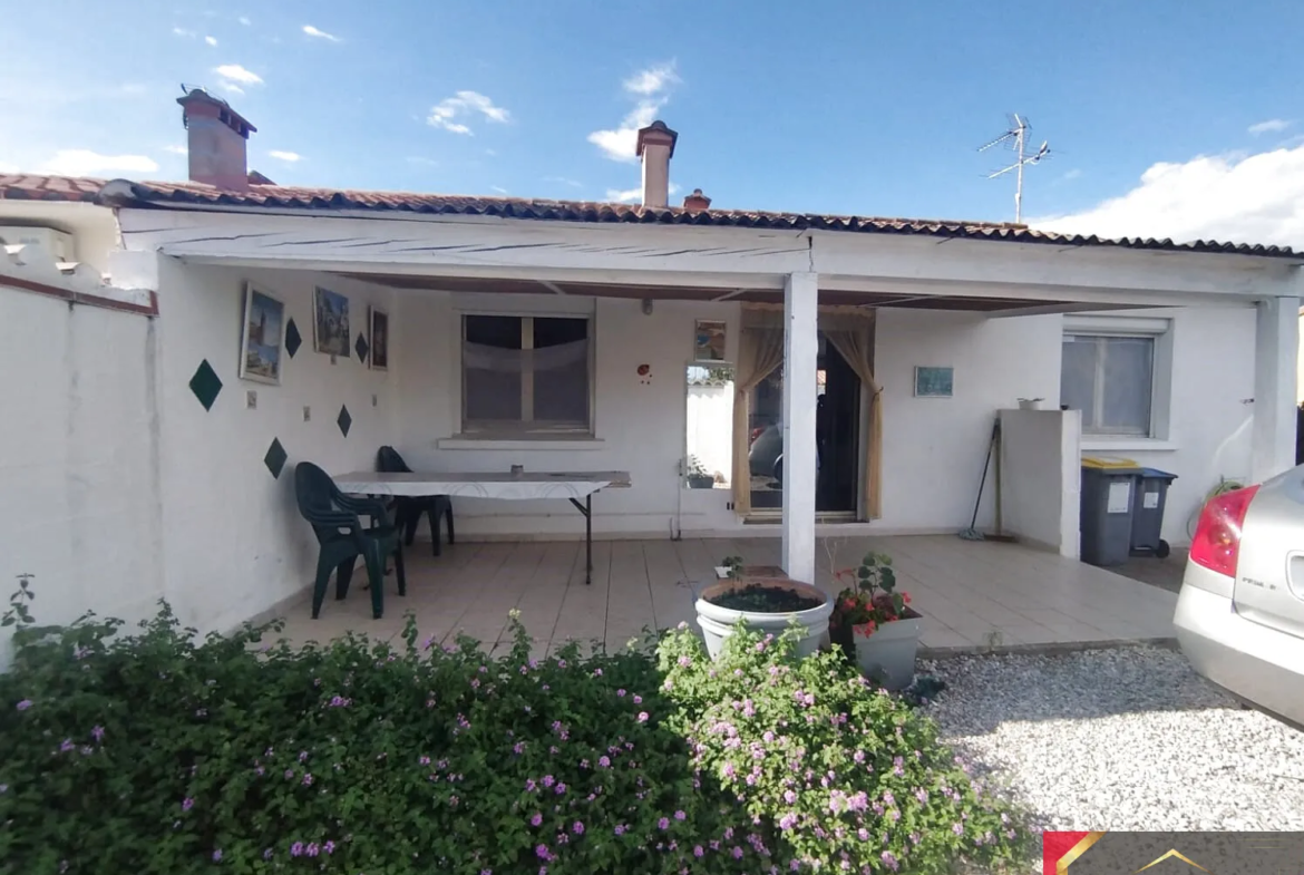 Maison à vendre à Montescot - 70 m², 3 faces, jardin et garage 