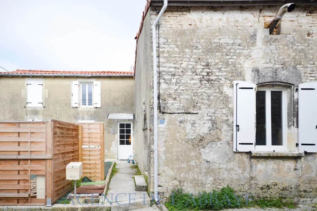 Immeuble avec 2 appartements de 60 m² et potentiel d'aménagement 