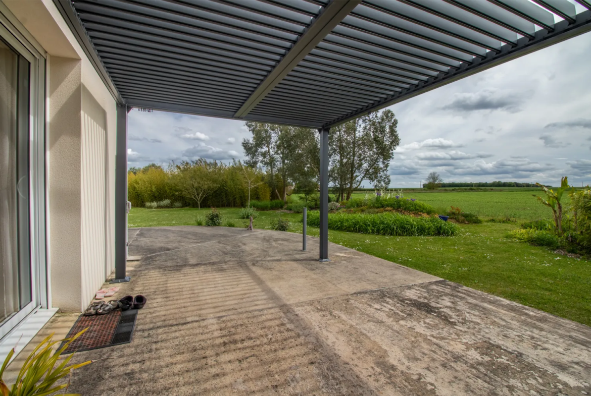 Maison de 118 m² avec 4 chambres et jardin à Champdolent 