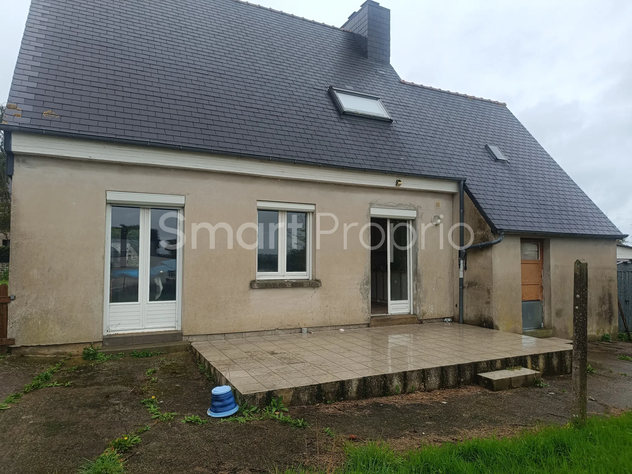 Maison à vendre au centre bourg de Henanbihen avec jardin 