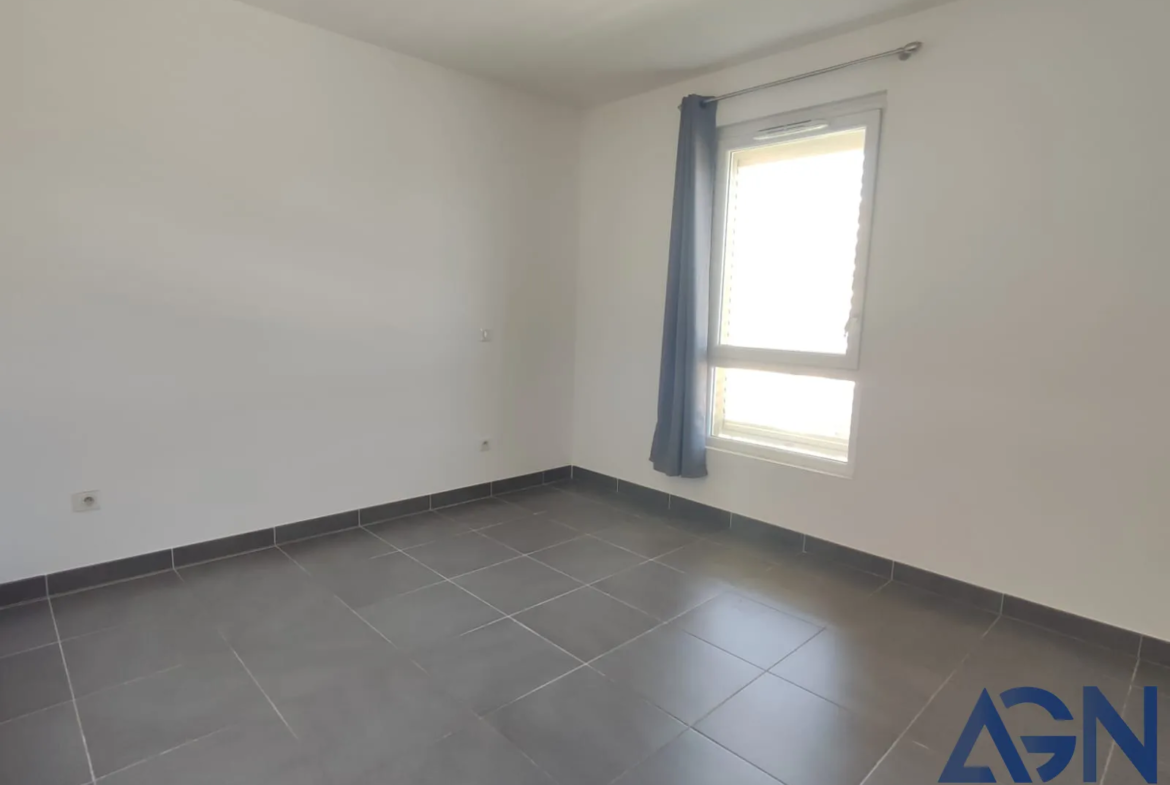 À vendre : Appartement 2 pièces avec terrasse et parking à Juvignac 