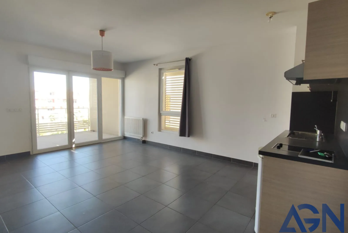 À vendre : Appartement 2 pièces avec terrasse et parking à Juvignac 