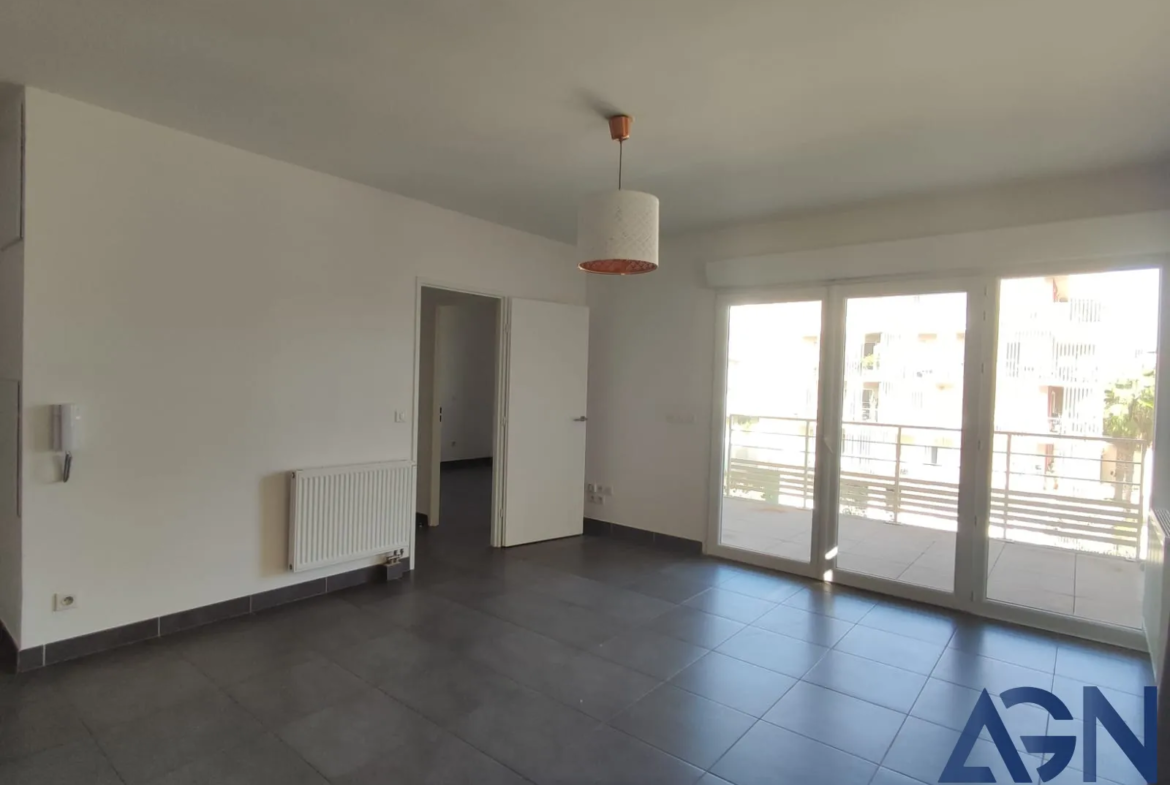 À vendre : Appartement 2 pièces avec terrasse et parking à Juvignac 