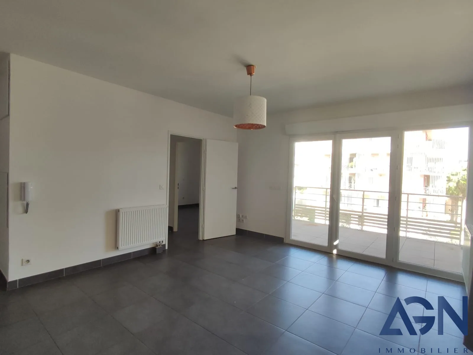 À vendre : Appartement 2 pièces avec terrasse et parking à Juvignac 