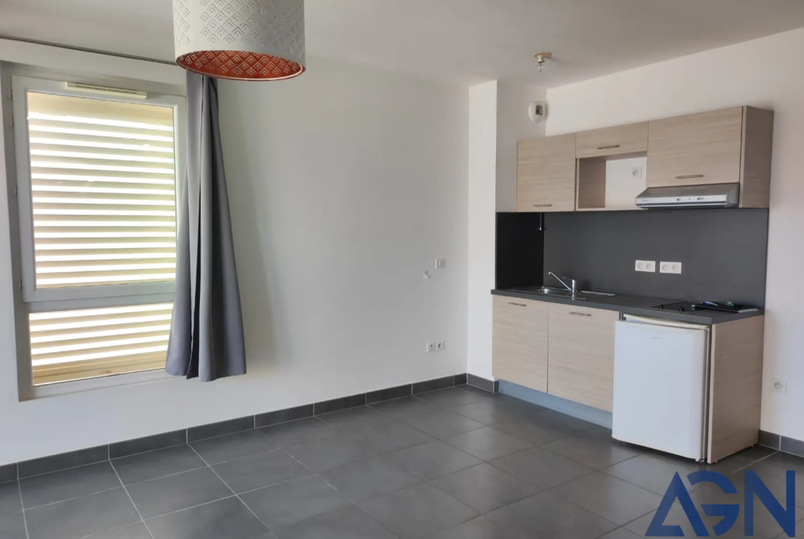 À vendre : Appartement 2 pièces avec terrasse et parking à Juvignac 