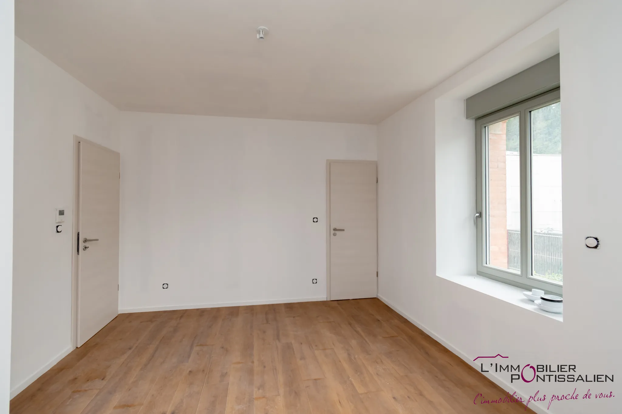 Appartement neuf de type 2 à La Cluse et Mijoux avec jardin 