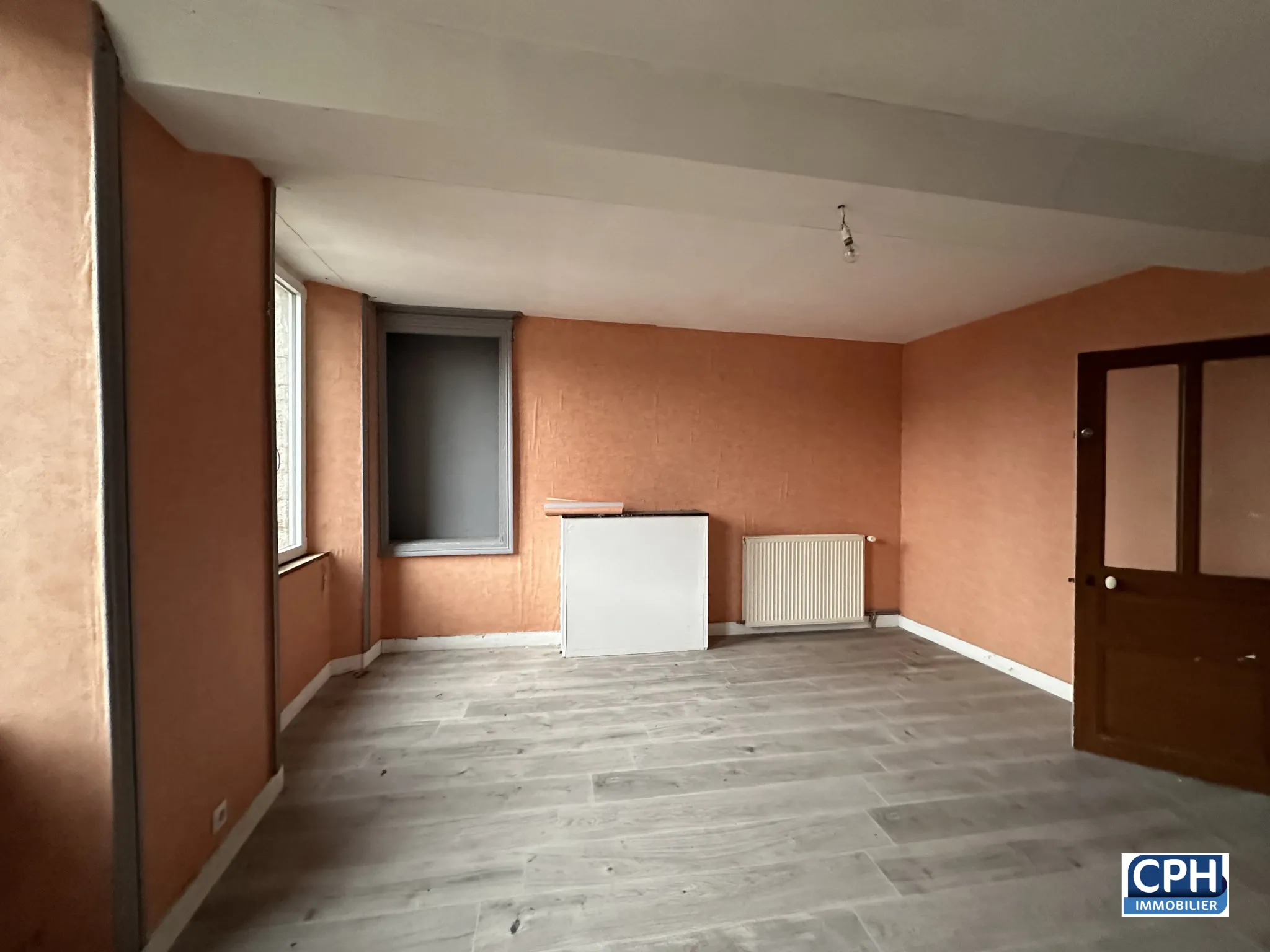 Maison de bourg de 137 m² à Montchauvet avec garage et potentiel d'agrandissement 