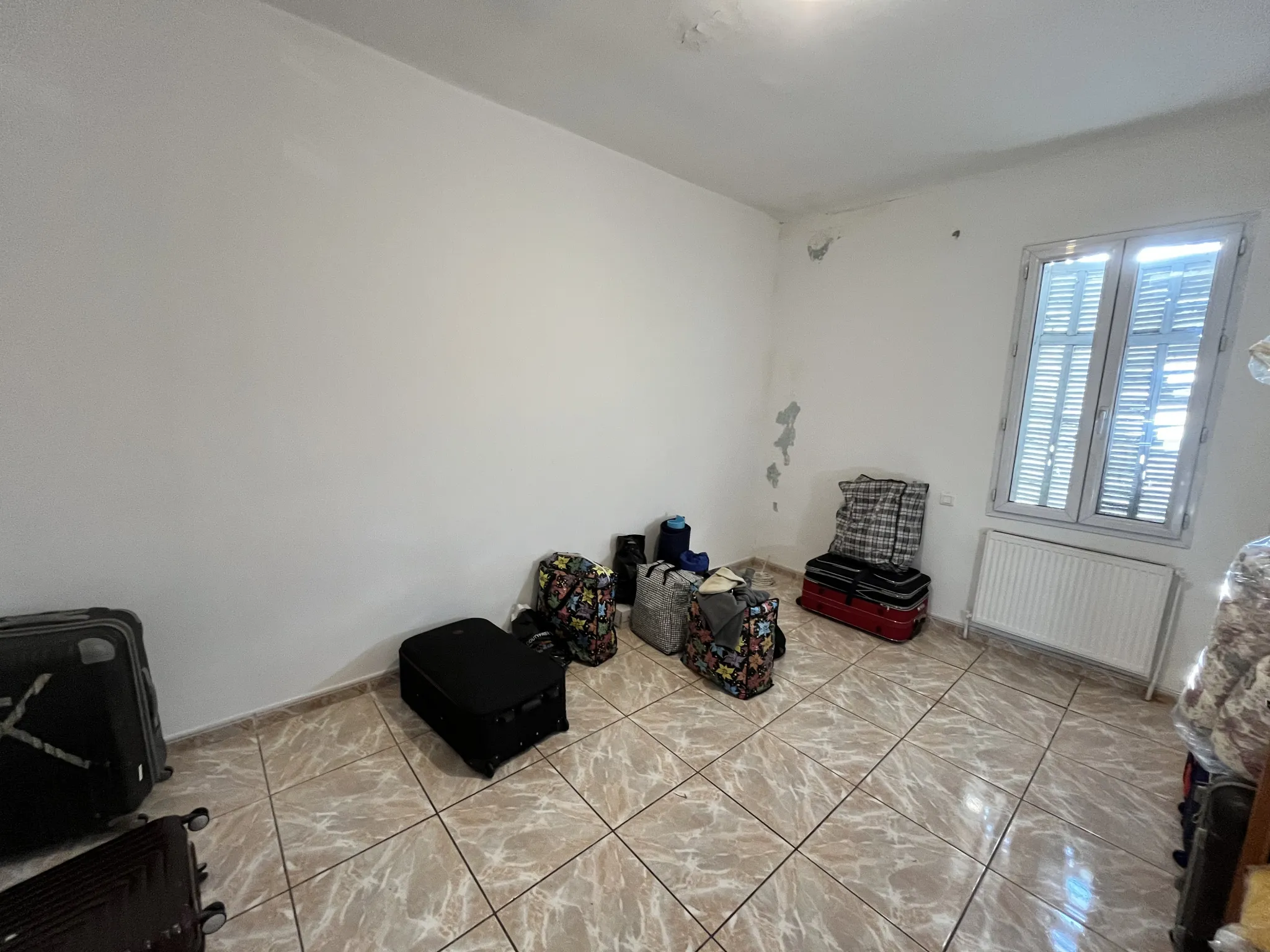 Maison 128 m2 avec fort potentiel en zone franche à Marseille 