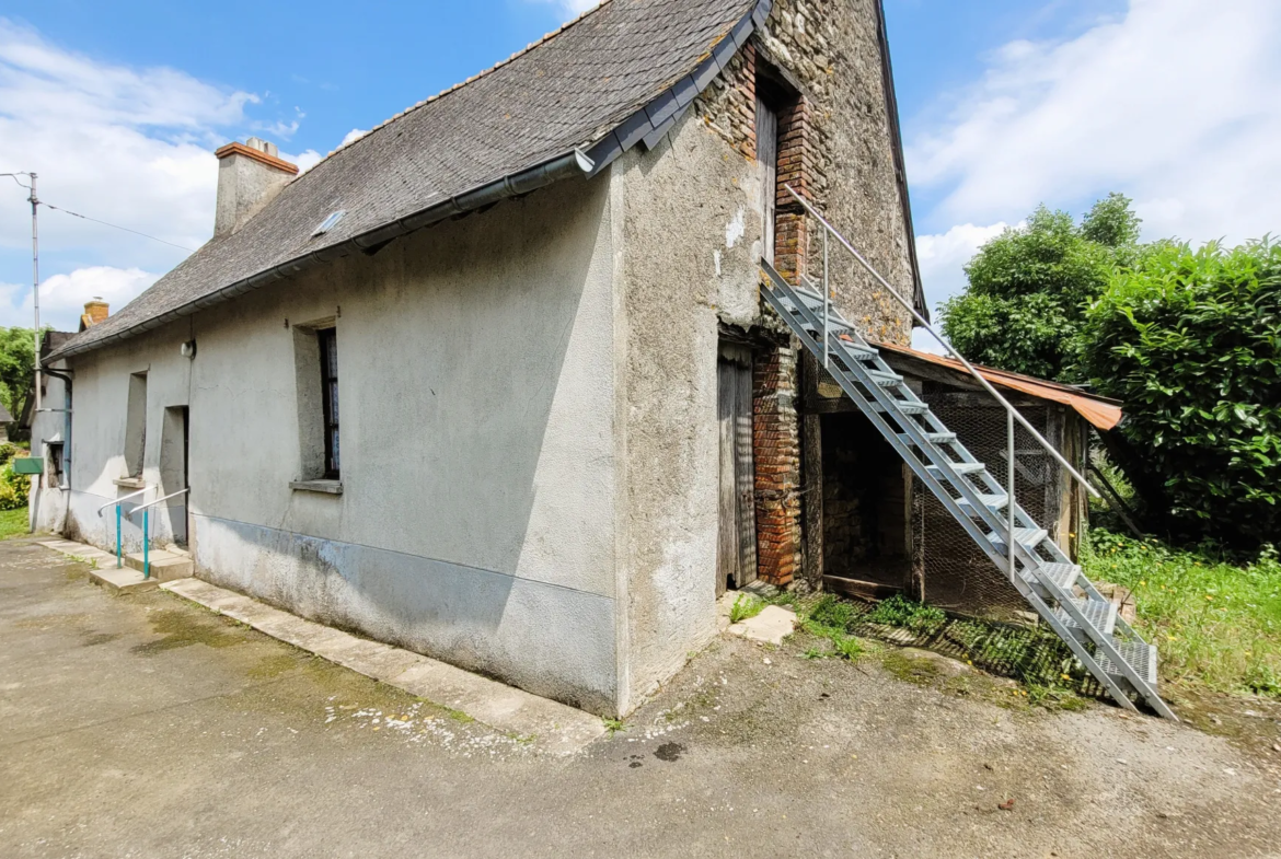 Maison à rénover en campagne de Moulins avec jardin et dépendances 