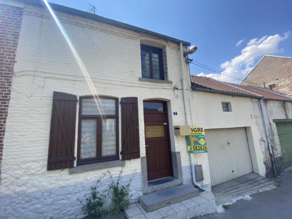 Maison en brique à vendre à Jeumont - 2 chambres, garage