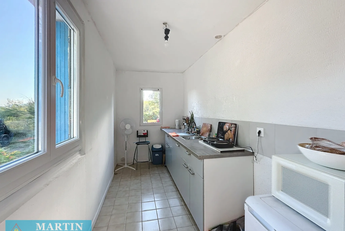 Appartement T2 avec jardinet et parking à Ceret 