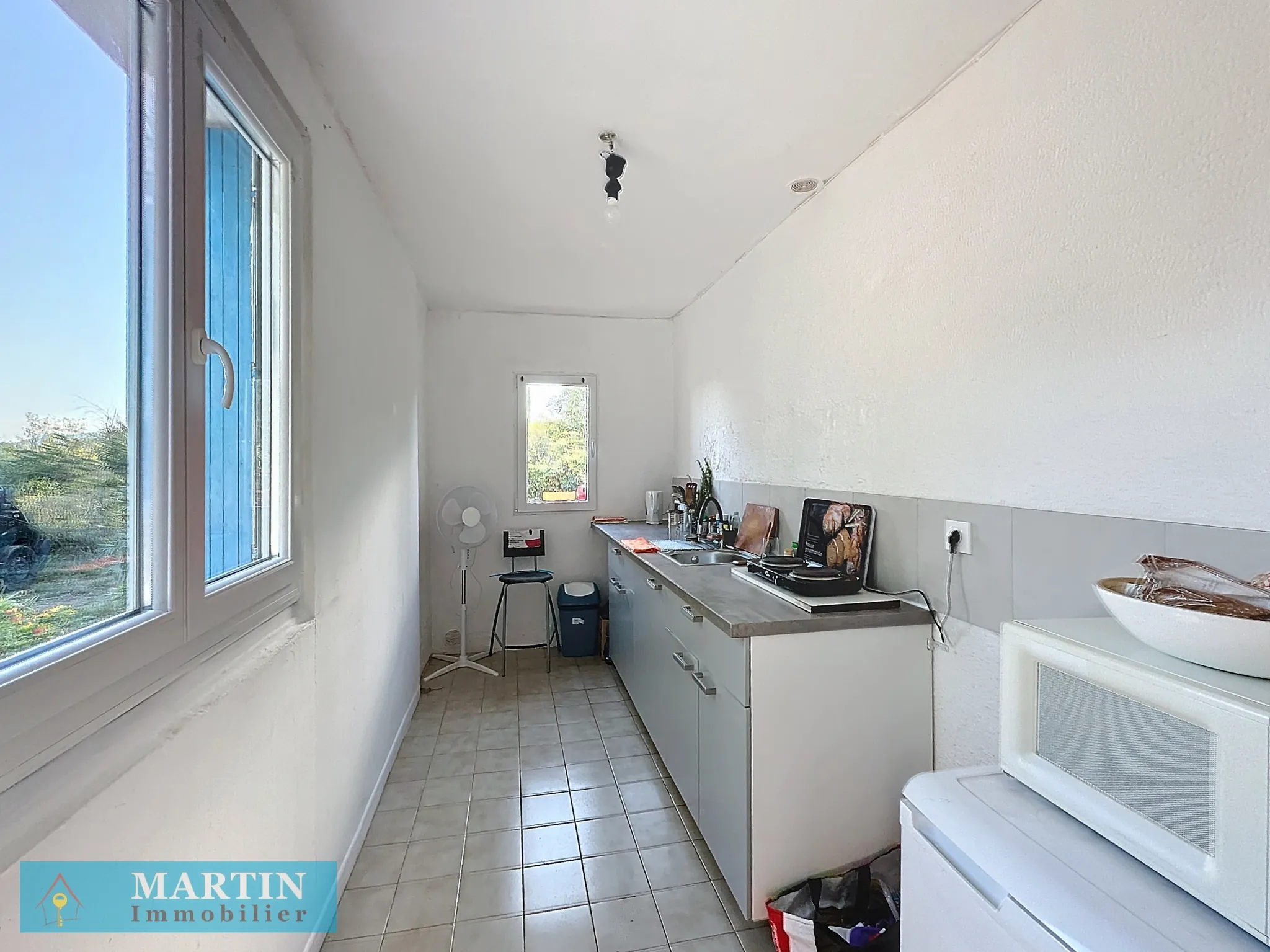 Appartement T2 avec jardinet et parking à Ceret 