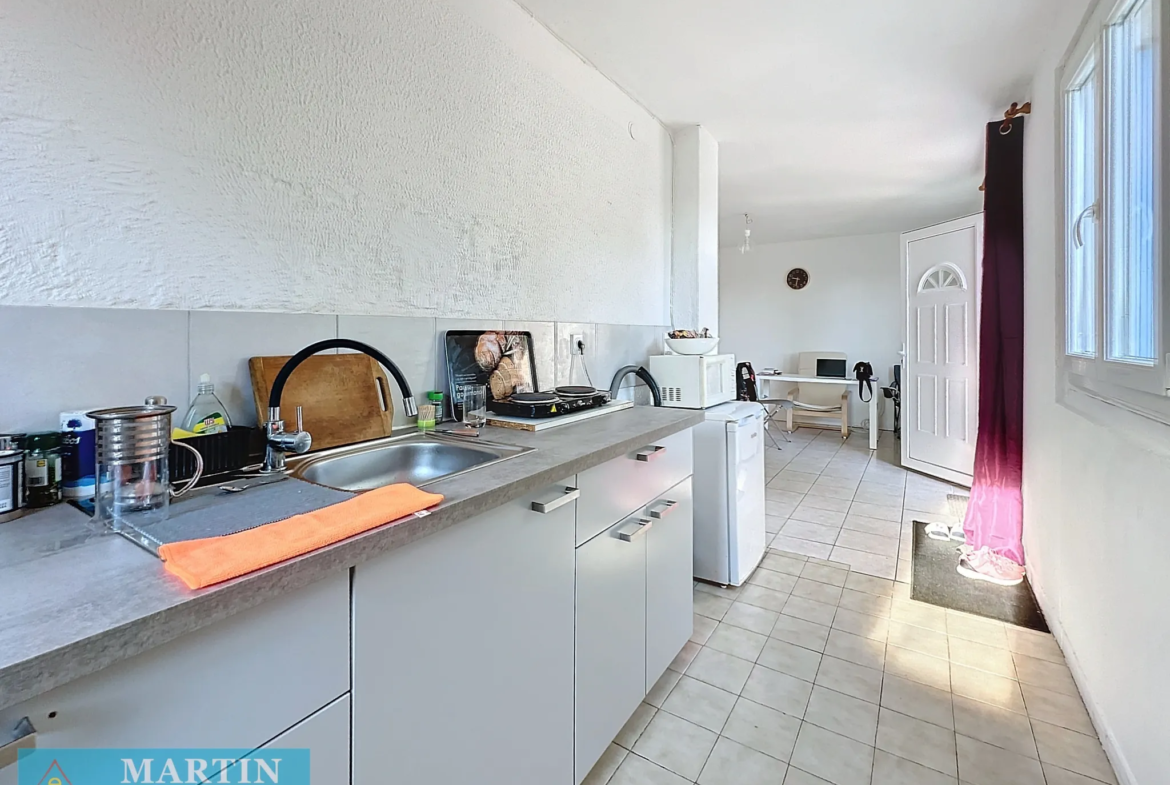 Appartement T2 avec jardinet et parking à Ceret 