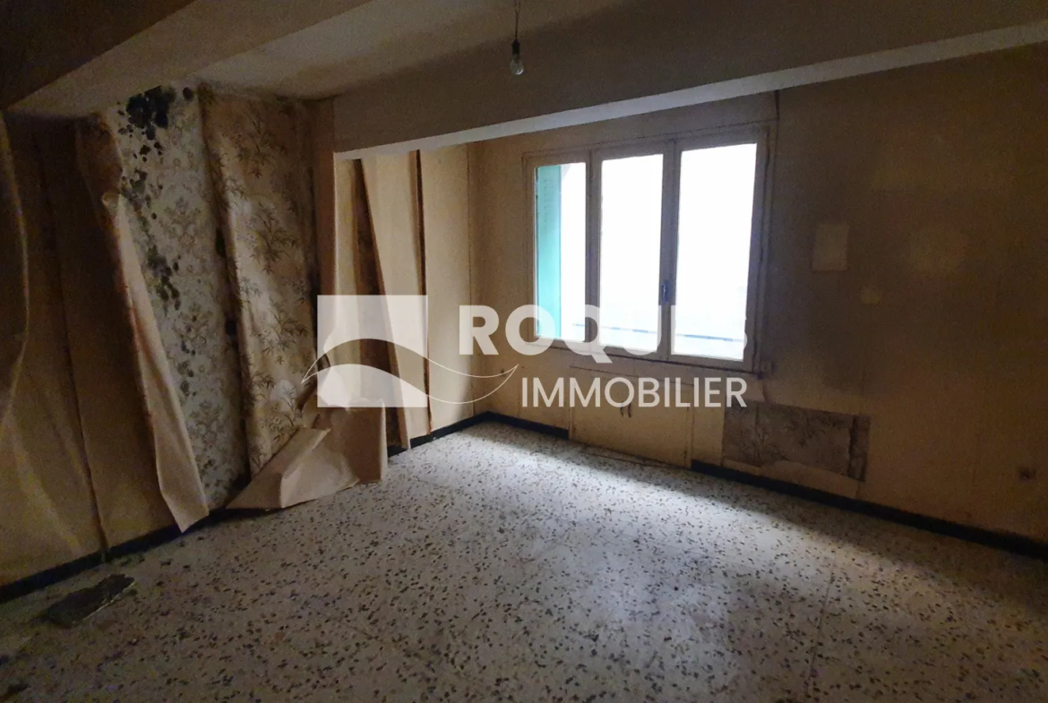 Lodève Centre - Appartement T3 à Rénover de 57 m² avec Garage et Cave 