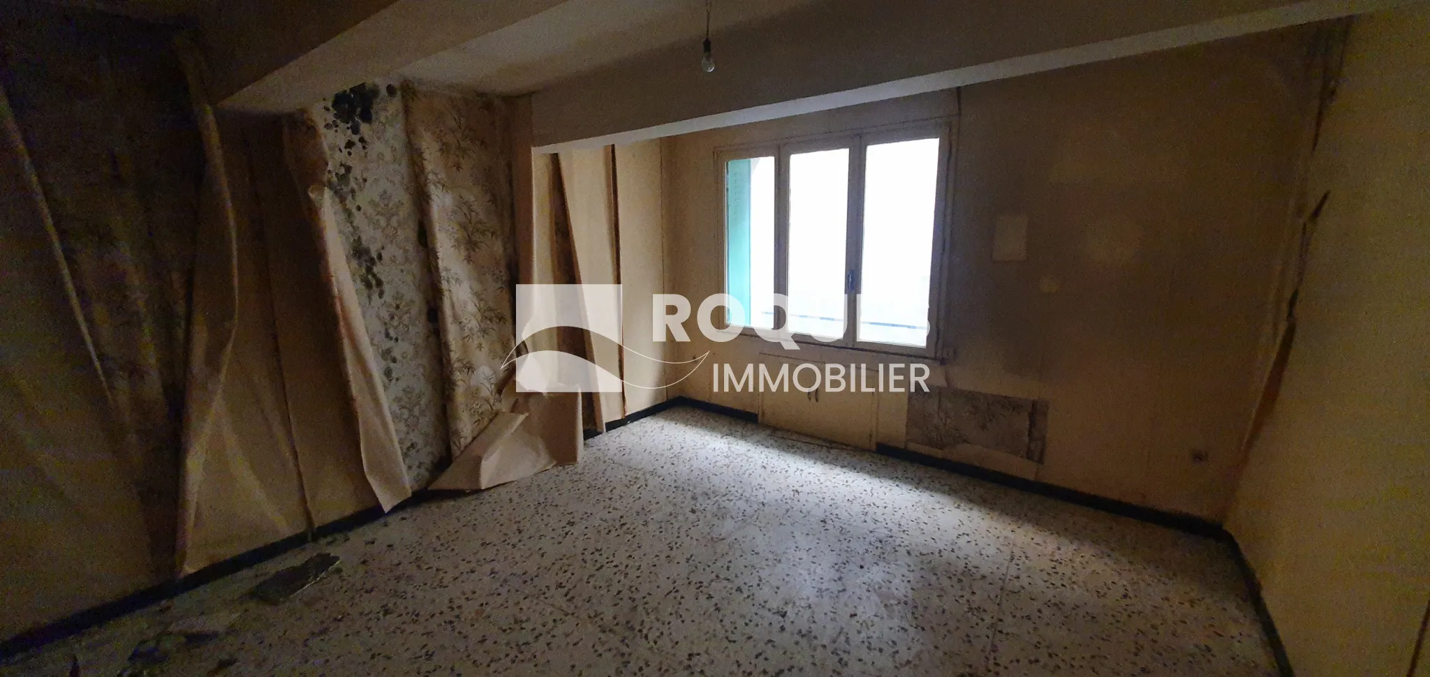 Lodève Centre - Appartement T3 à Rénover de 57 m² avec Garage et Cave 