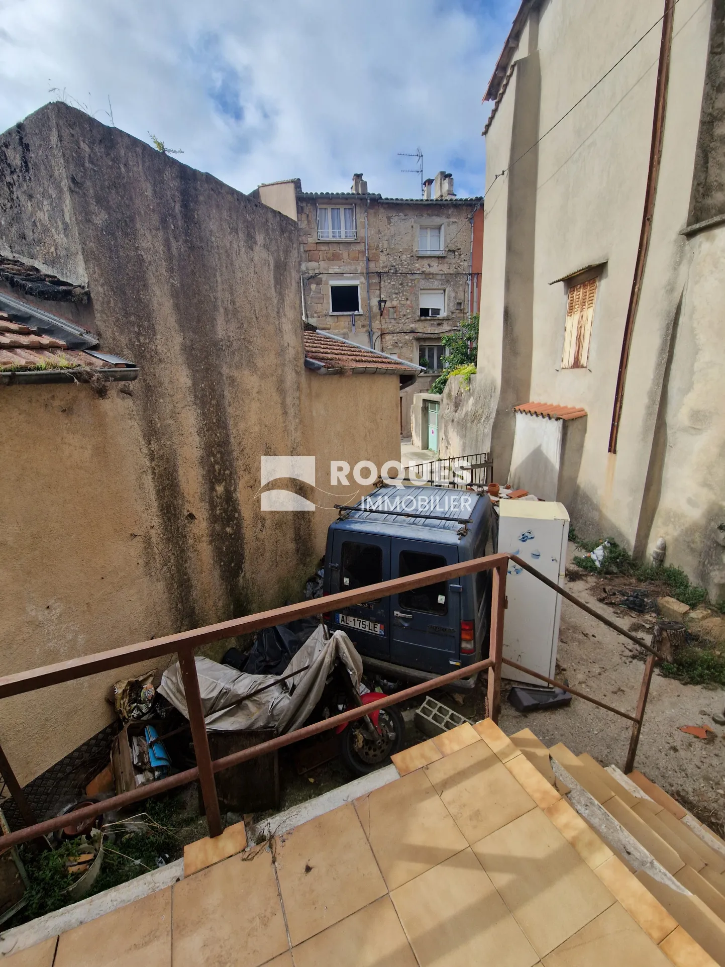 À vendre : Maison de ville à rénover à Lodève - 100 m² avec cour 