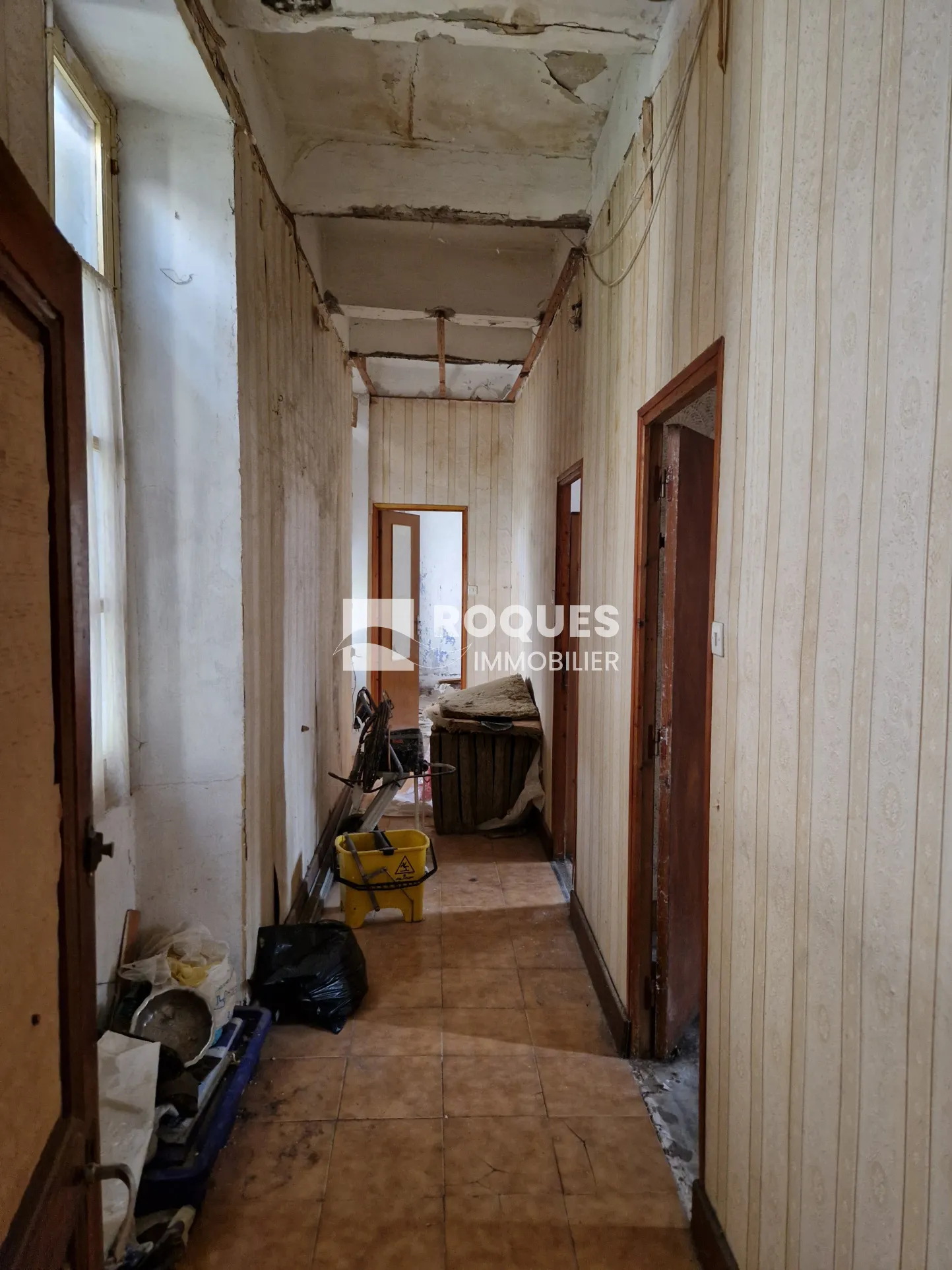 À vendre : Maison de ville à rénover à Lodève - 100 m² avec cour 