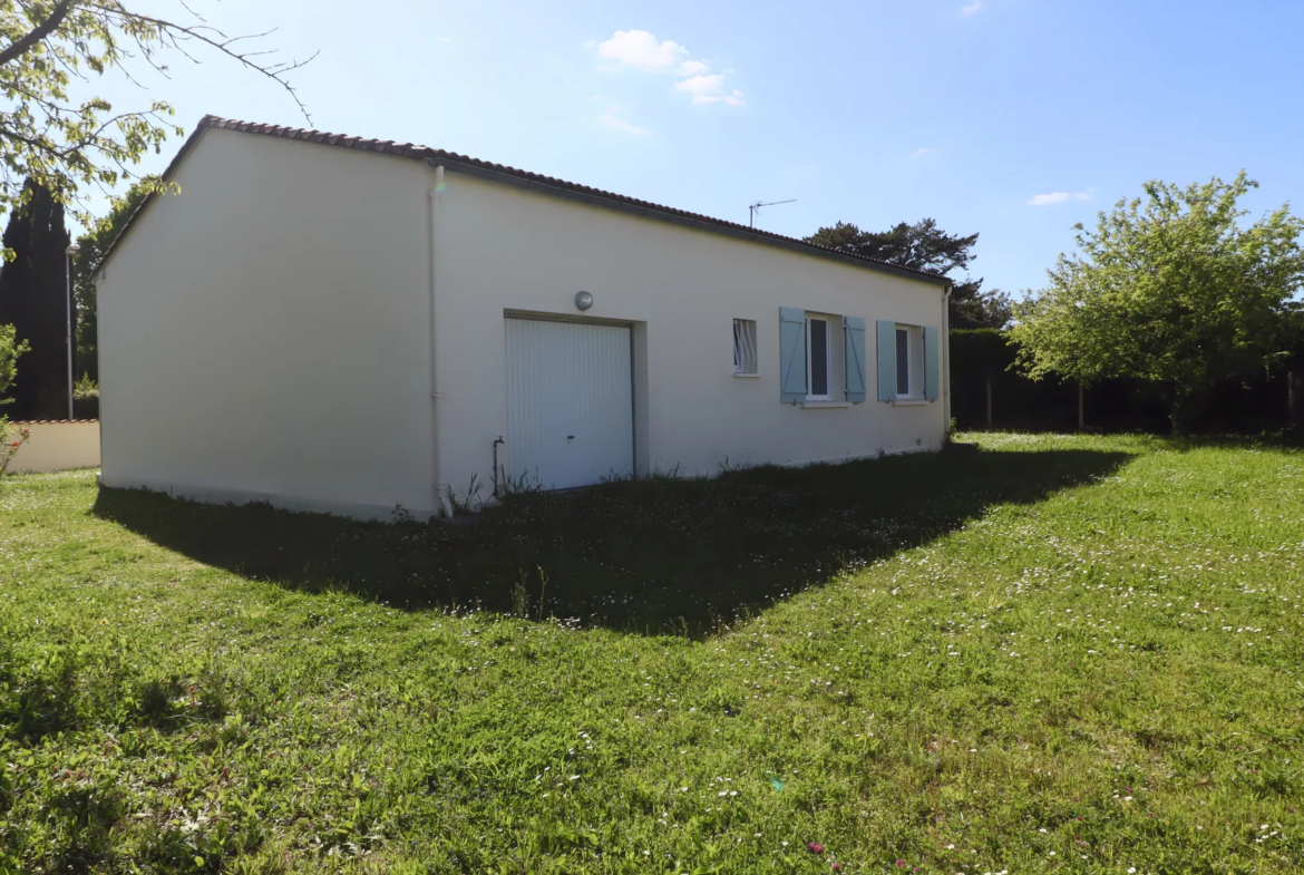 Maison de plain-pied à Médis, 3 chambres avec jardin et garage à vendre 