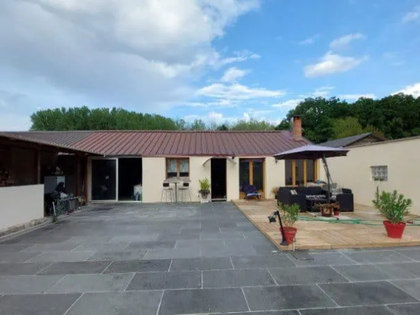 Maison en zone artisanale à Dourdan avec atelier et espace de vie spacieux