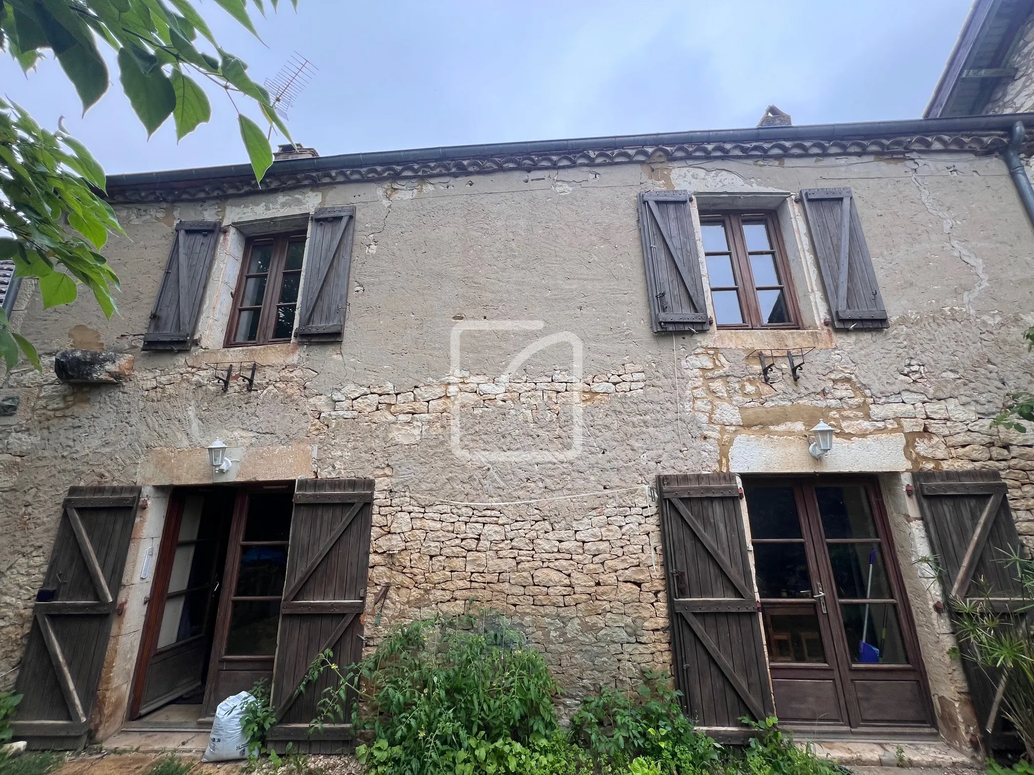 Maison de village en pierres à Cazoules à rénover 