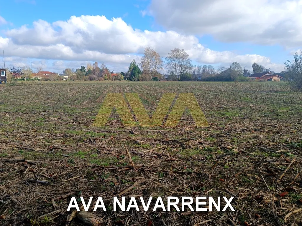 Terrain constructible plat de 1590 m² à Navarrenx 