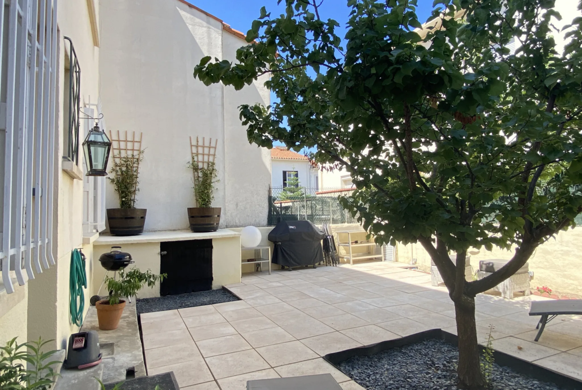 Maison de ville avec jardin et garage à Perpignan 