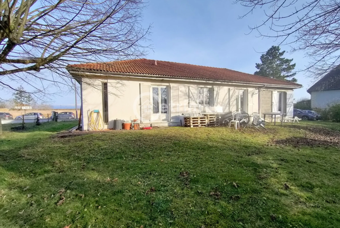 Maison de plain-pied de 105 m² à Maringues avec jardin et garage 