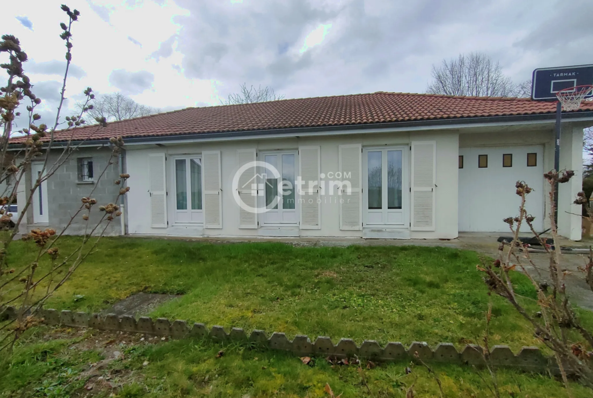 Maison de plain-pied de 105 m² à Maringues avec jardin et garage 