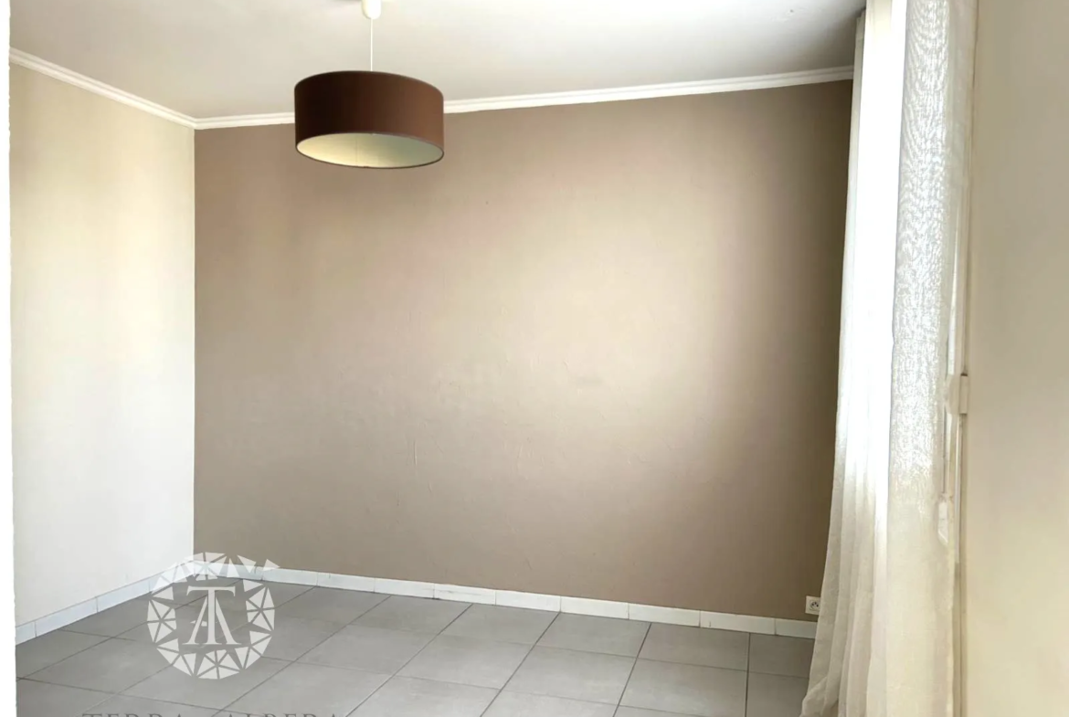 Appartement T3/4 à vendre sur la Place de la Sardane à Perpignan 