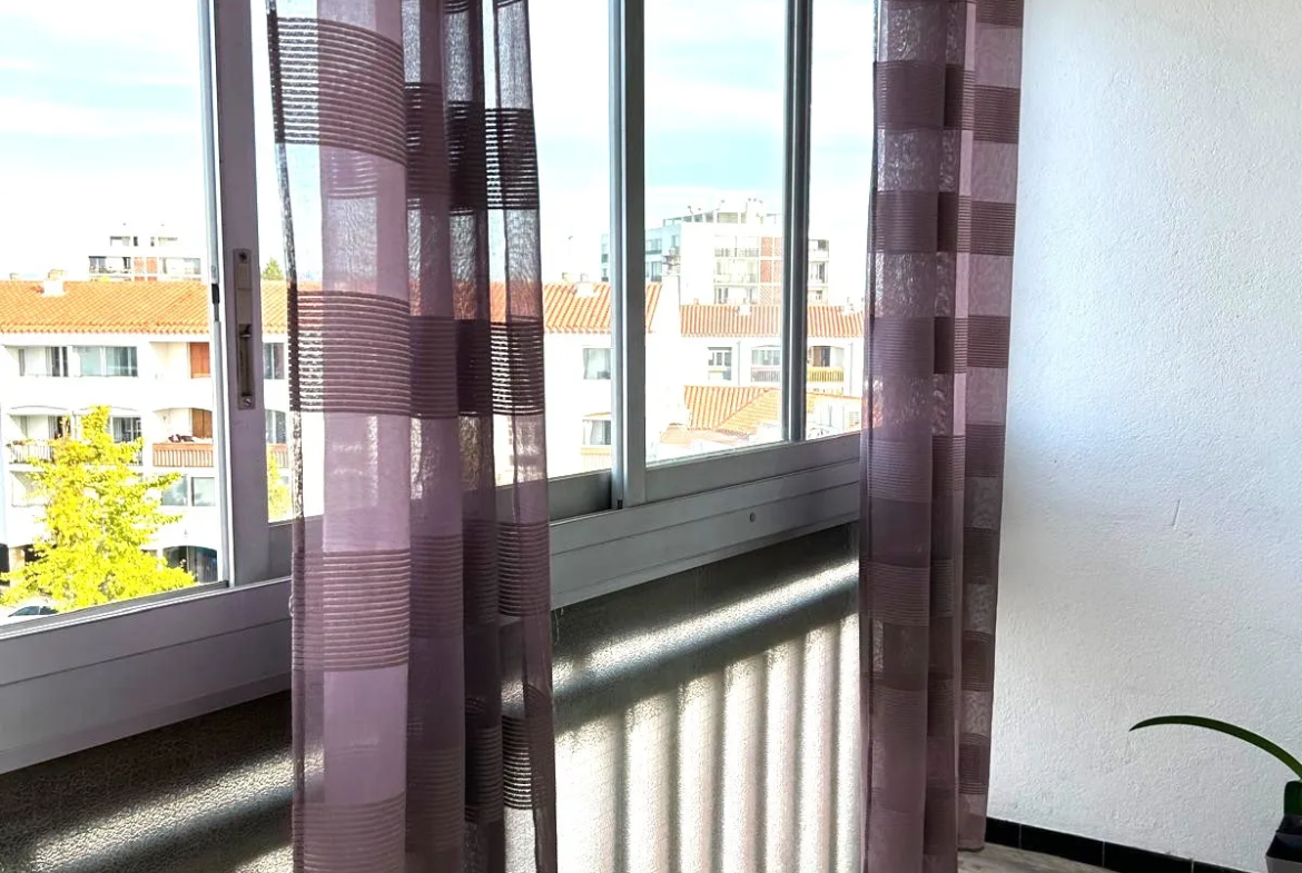 Appartement T3/4 à vendre sur la Place de la Sardane à Perpignan 