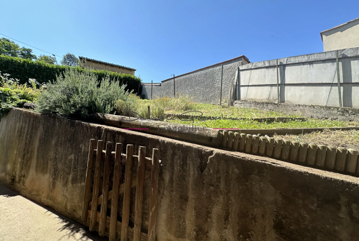 Maison spacieuse à Balbigny avec sous-sol complet et jardin 