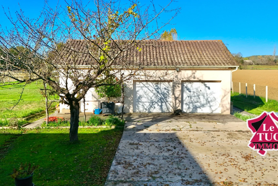 Maison 4 chambres avec double garage et grand jardin à Dausse 