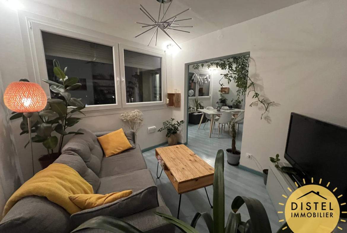 À vendre : Appartement lumineux 5 pièces à Mundolsheim avec balcon et garage 