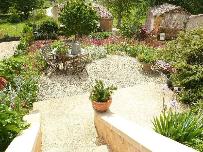 Maison familiale à Lacapelle - 4 chambres, jardin et véranda climatisée 